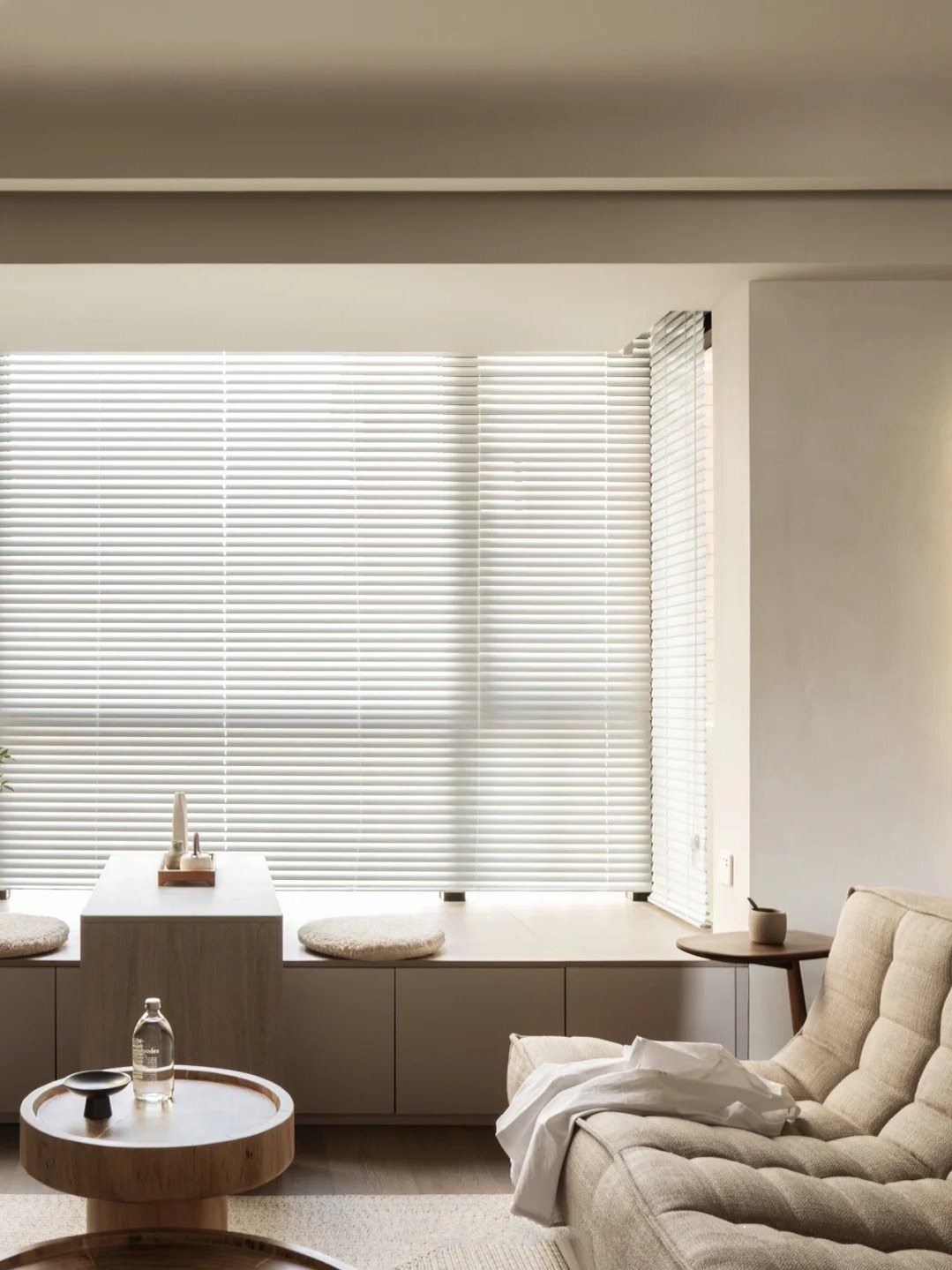 Venetian blinds shading a living-room window